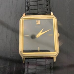Seiko Black and Gold Men's Watch